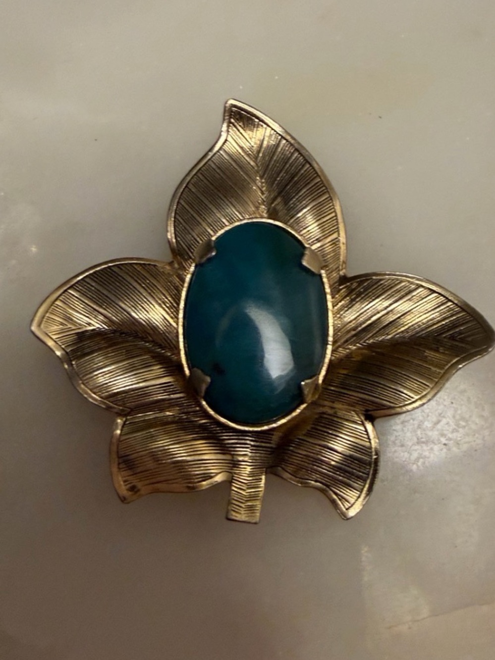 Silver tone leaf brooch with‎ blue cabochon stone pin